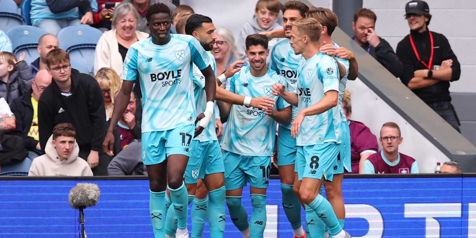 West Ham United's Manor Solomon celebrates scoring their second goal with teammates 