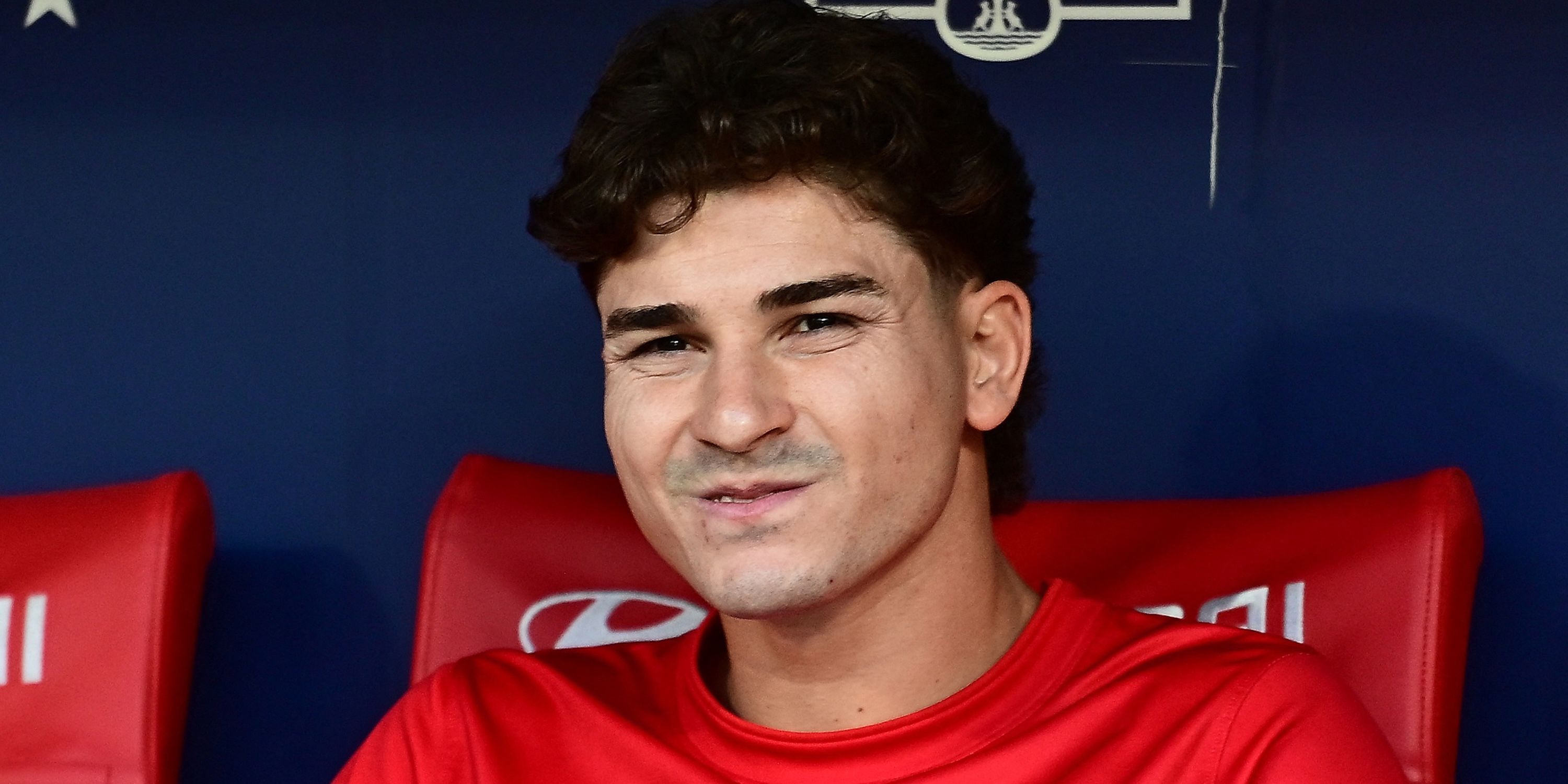 Atletico Madrid's Julian Alvarez on the bench before the match