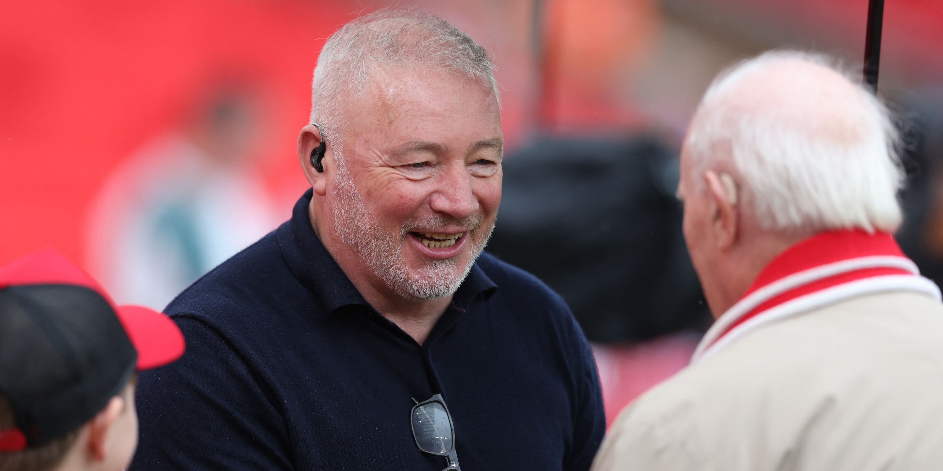 Former Scotland player and TV pundit Ally McCoist inside the stadium before the match