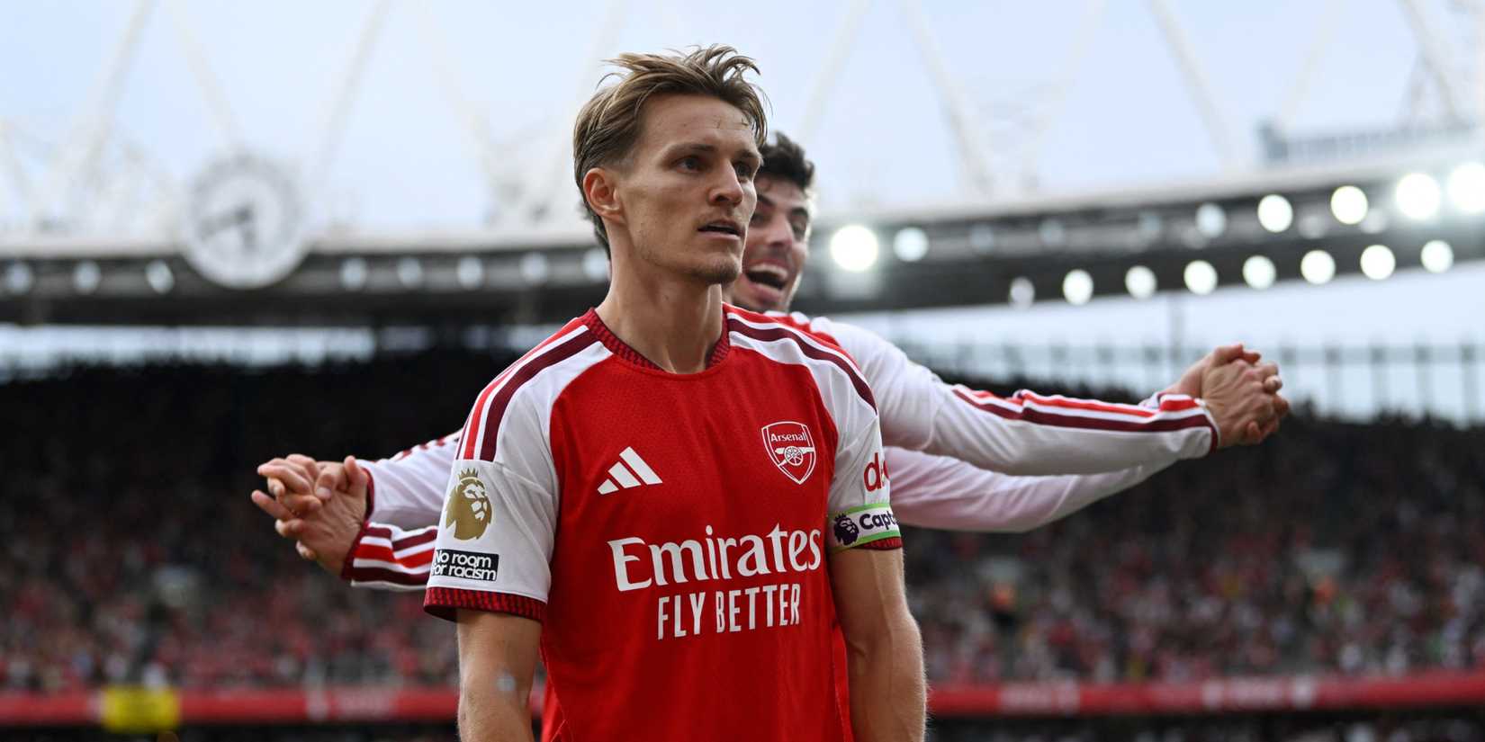 Martin Odegaard celebrates scoring for Arsenal vs Chelsea