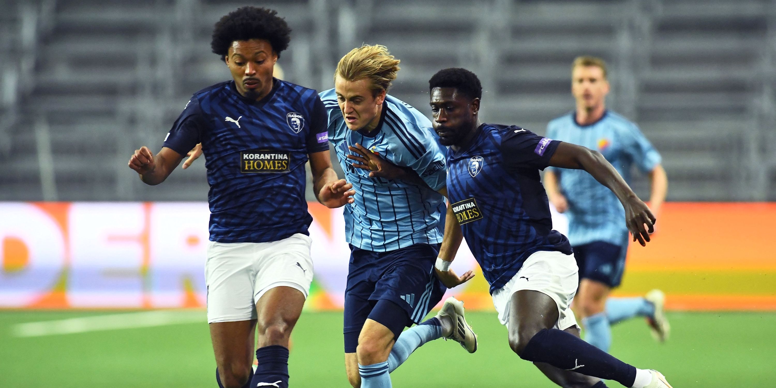 Pafos' Bruno and Derrick Luckassen in action with Djurgarden's Oskar Fallenius