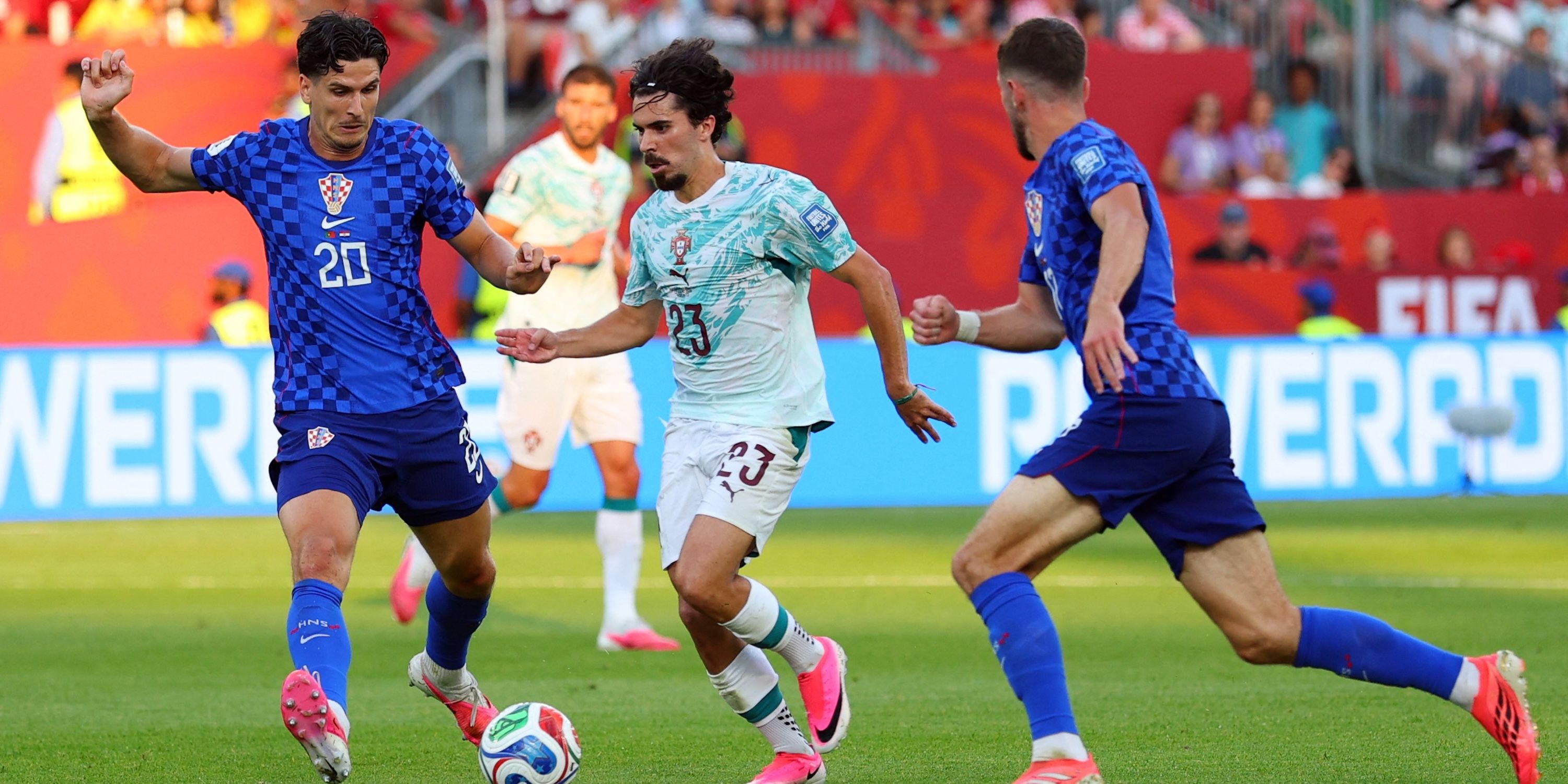 Portugal's Vitinha in action with Croatia's Igor Matanovic
