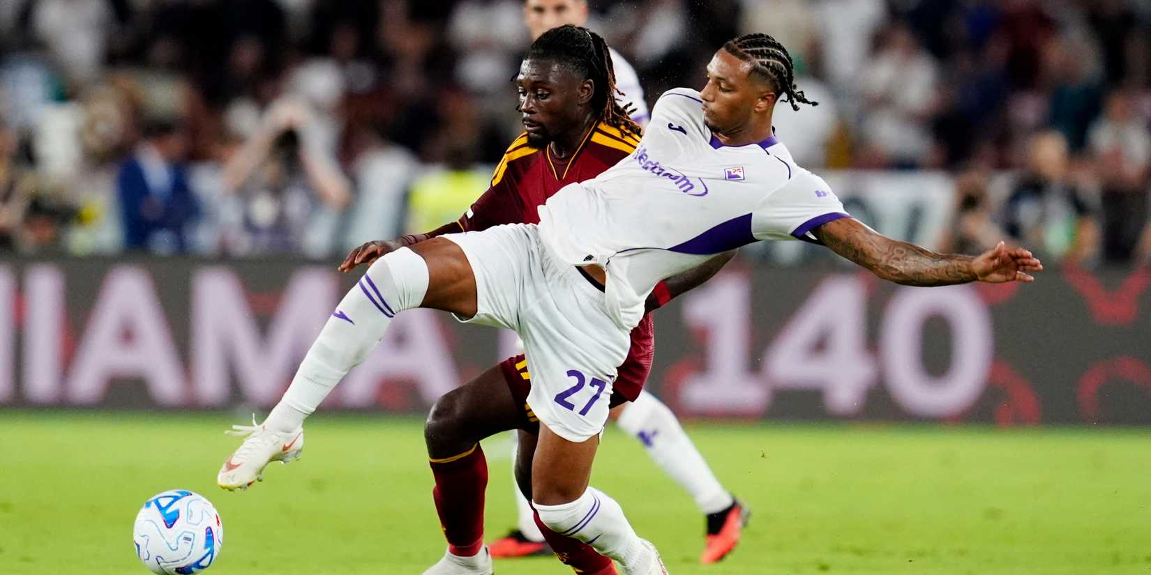 Roma's Manu Kone in action with Fiorentina's Cher Ndour