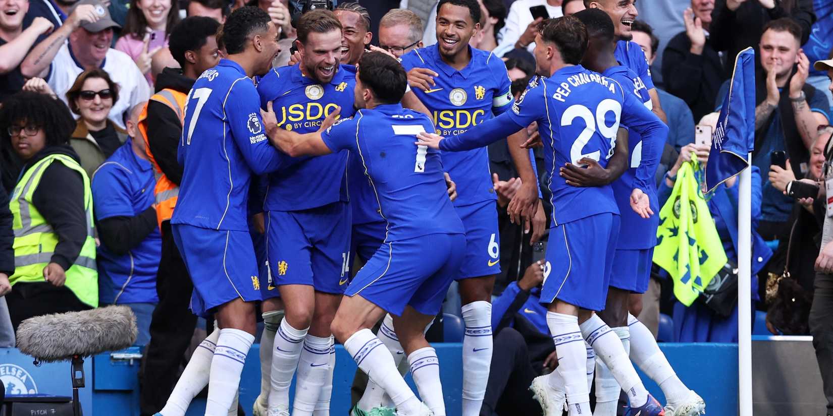 Chelsea's Jordan Henderson celebrates scoring their fifth goal with teammates