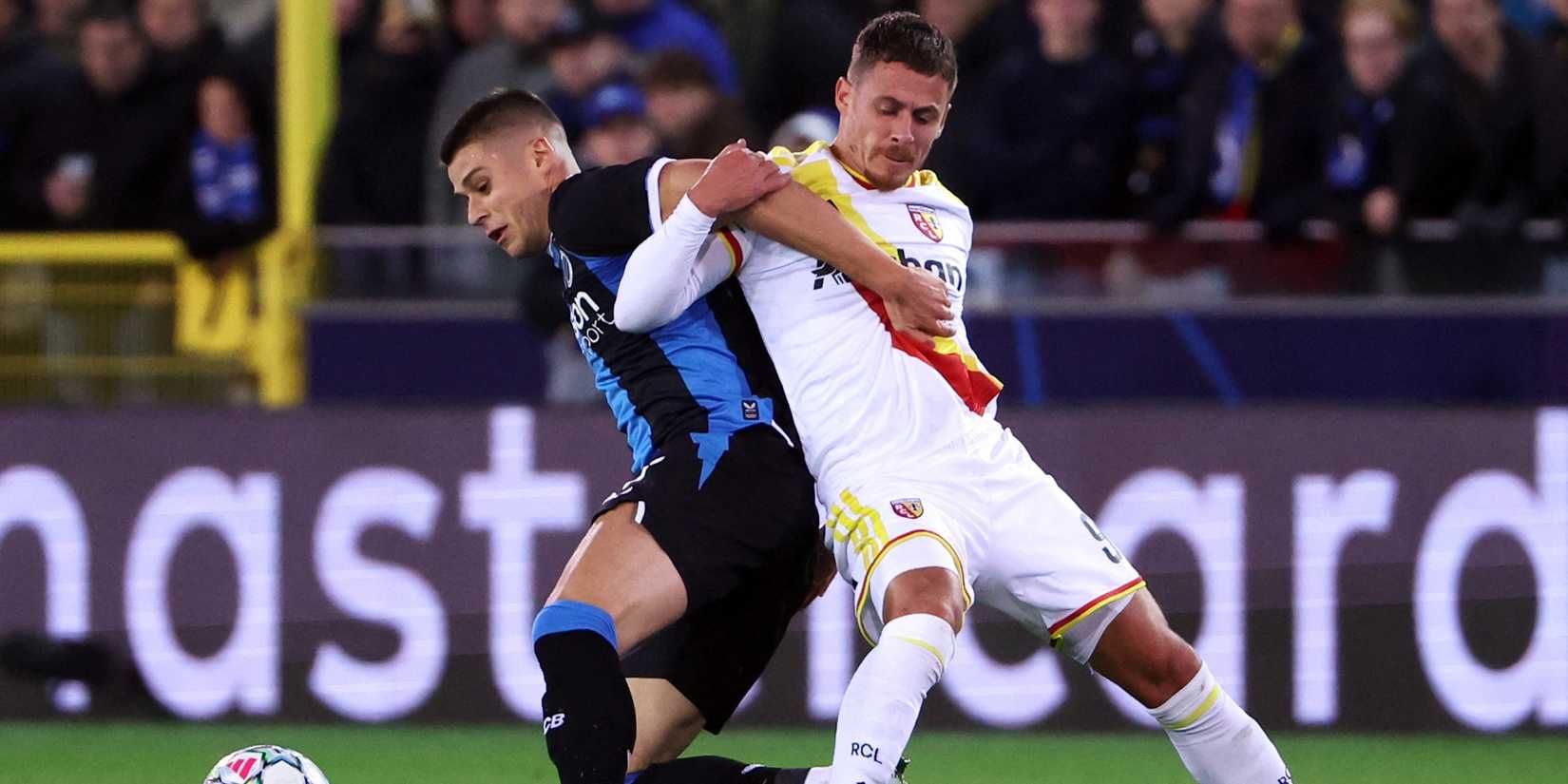 Club Brugge's Nicolo Tresoldi in action with RC Lens' Thorgan Hazard