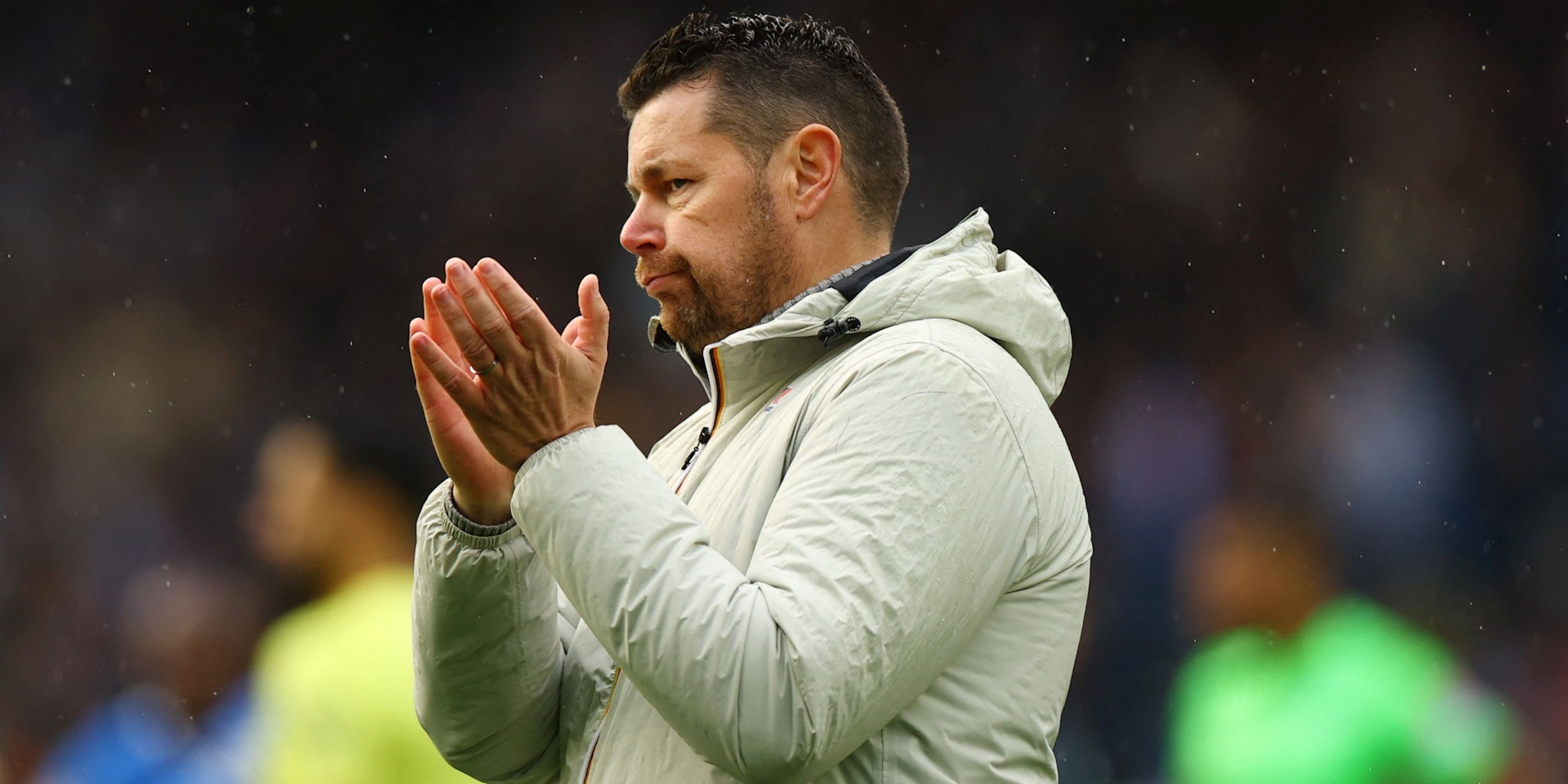 Crystal Palace manager Pierre Sage applauds fans after the match
