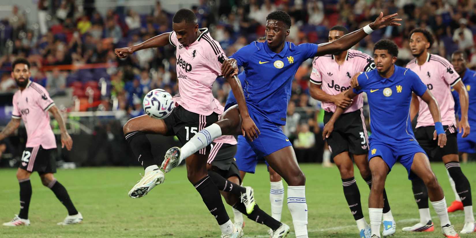 Juventus' Pierre Kalulu in action with Chelsea's Mamadou Sarr