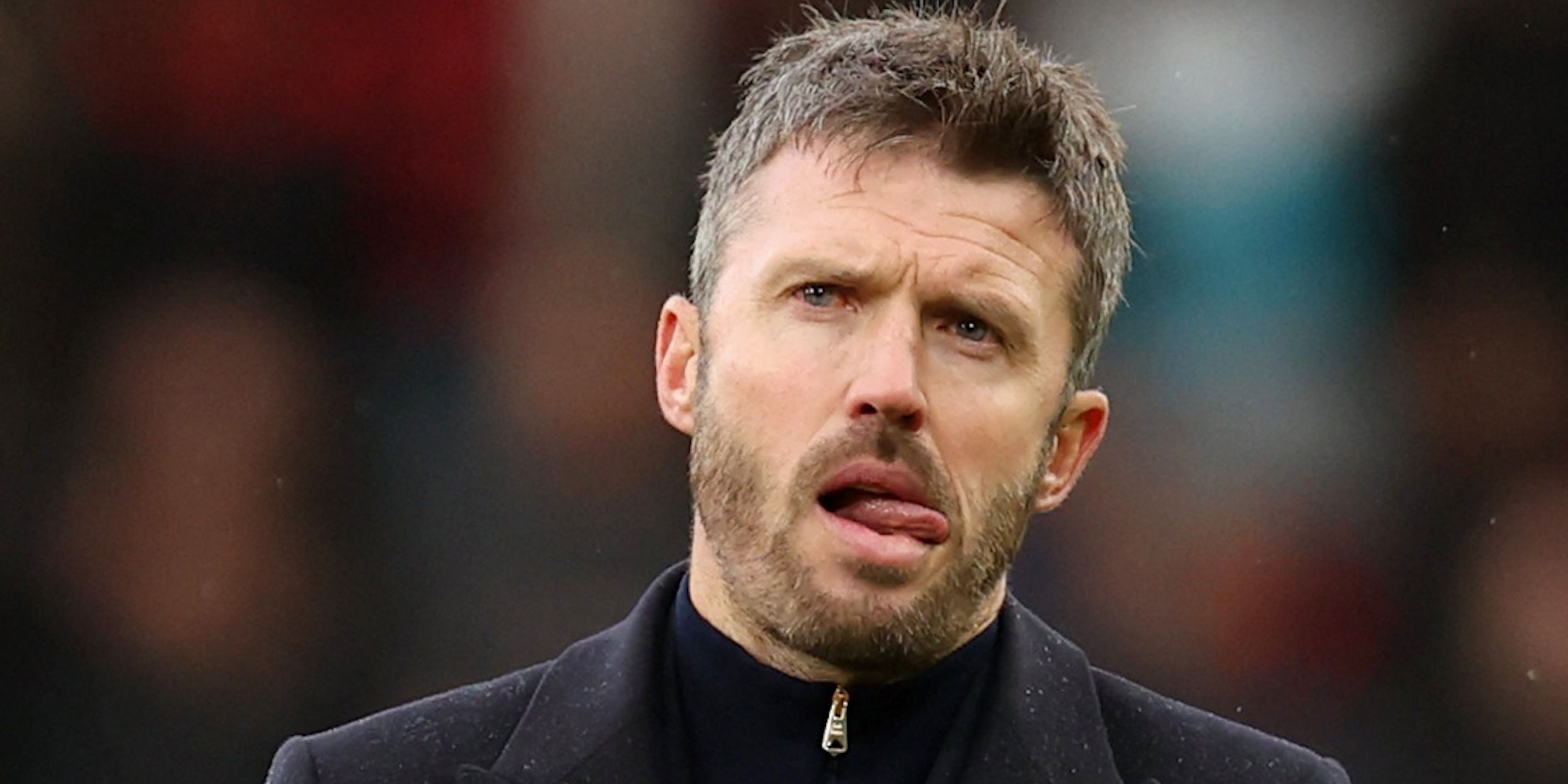 Manchester United manager Michael Carrick looks dejected as he applauds fans after the match
