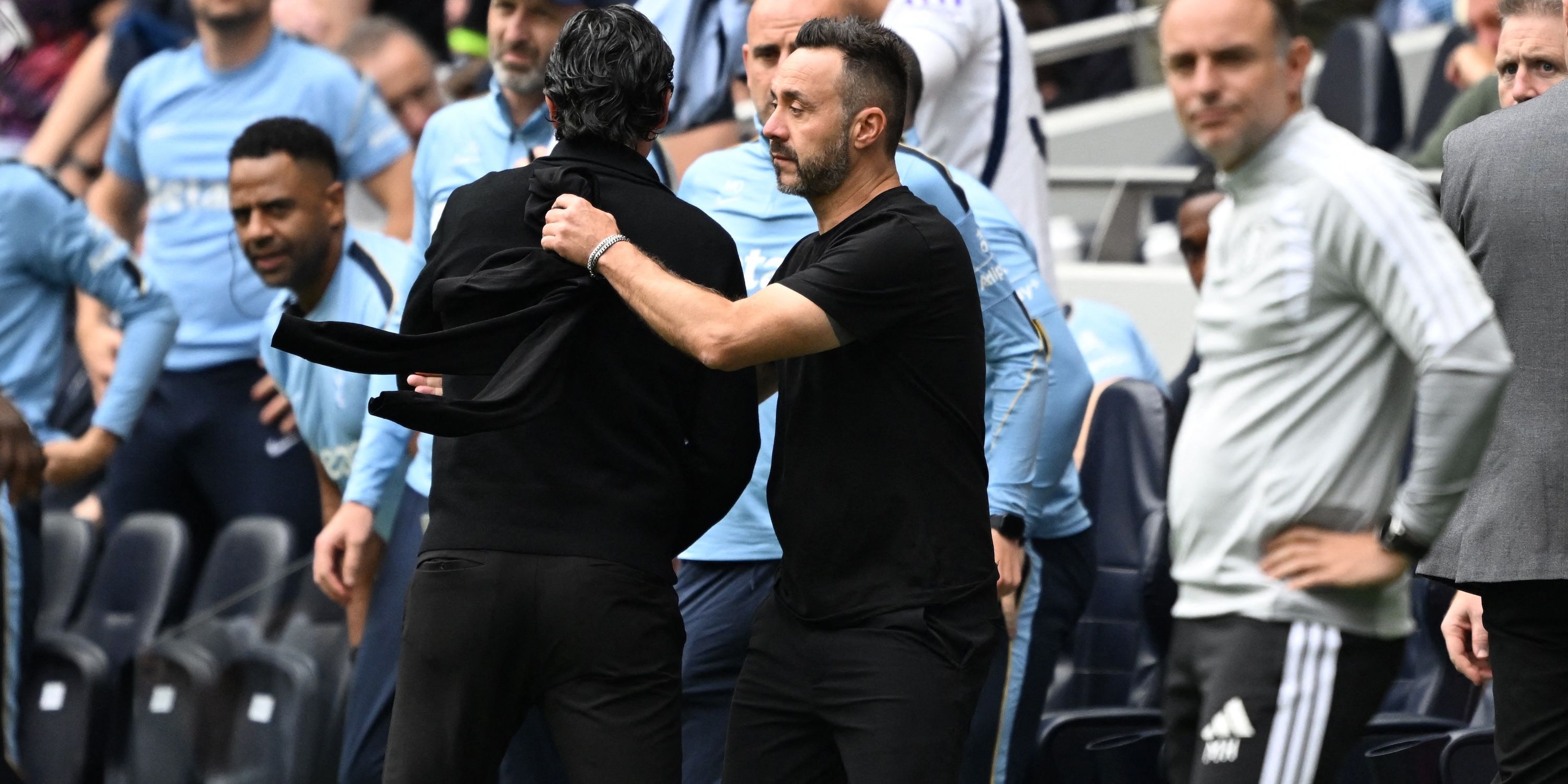 Tottenham Hotspur manager Roberto De Zerbi looks dejected after the match